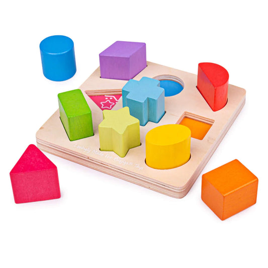 Chunky wooden shape pieces and a sturdy baseboard – perfect for little hands learning about shapes and colours.
