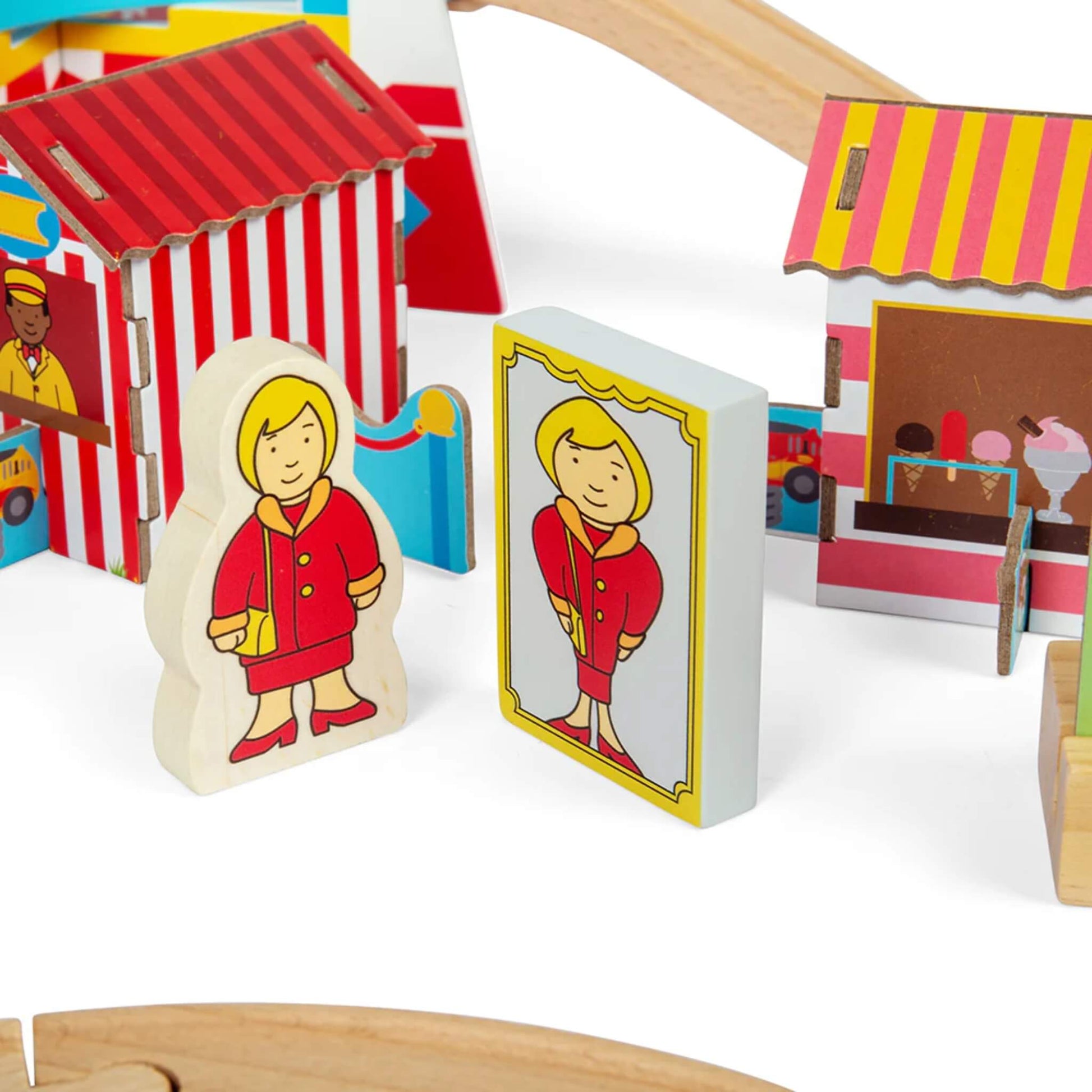Wooden character dressed in red posed next to a funfair-style mirror board with matching illustration.