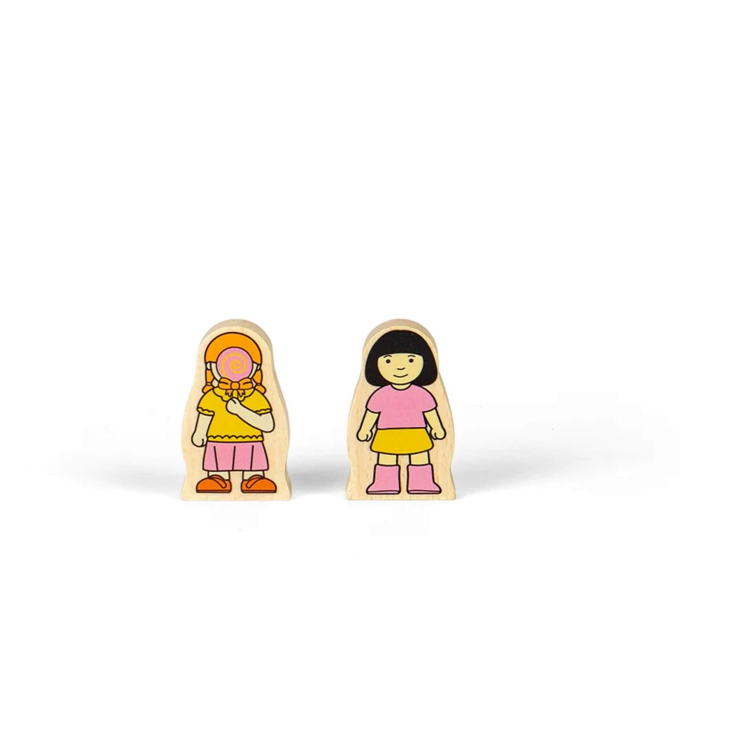 Wooden girl figures from the Fun Fair Train Set, one holding a large spiral lollipop and the other smiling in pink and yellow clothes.
