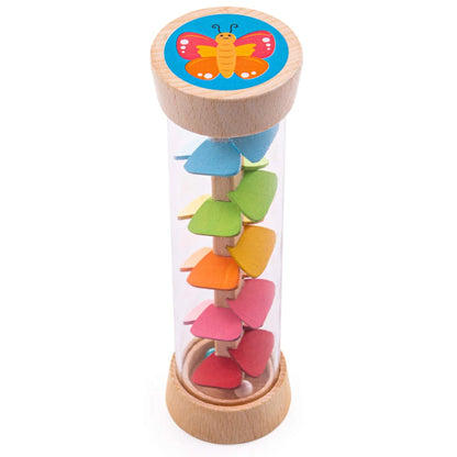 Bigjigs Toys Garden Rainmaker shown upright, featuring a colourful butterfly illustration on top and rainbow wooden paddles inside.