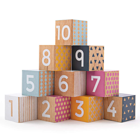 Bigjigs Toys FSC® Certified Wooden Number Blocks arranged in a colourful pyramid, showing numbers 1 to 10 with bold patterns and smooth wooden edges.