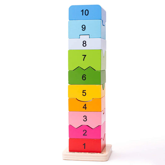 A rainbow-coloured Bigjigs Toys Number Tower fully stacked from 1 to 10, each block showing bold black numerals on wooden blocks in gradient colours, resting on a natural wooden base.