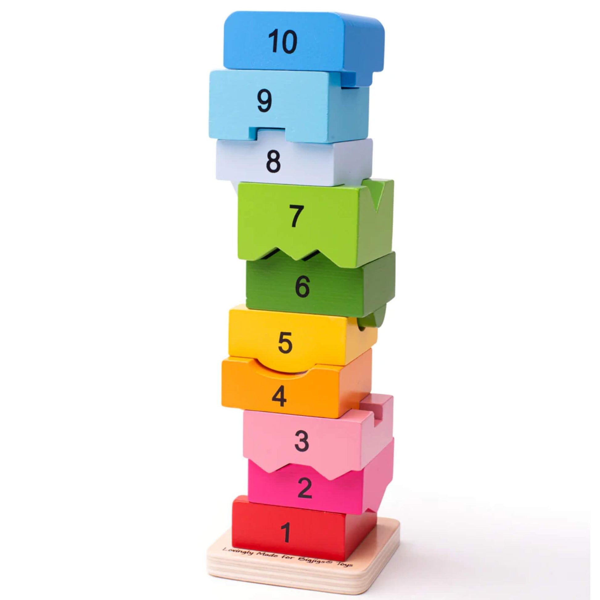 Wooden blocks from the Bigjigs Toys Number Tower partially stacked and tilting, showing how each numbered piece connects by shape as well as sequence.
