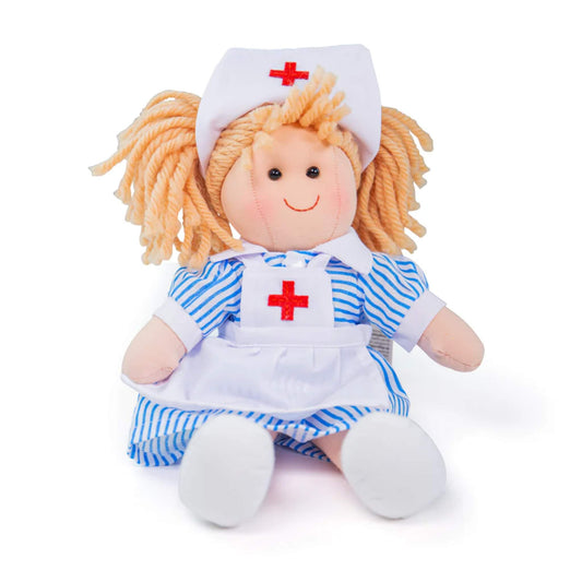 Nurse Nancy doll seated, showing her striped dress, white apron and smiling face with rosy cheeks.