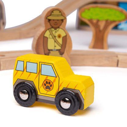 Close-up of the yellow safari jeep with paw print badge, placed near a ranger character and a tree piece.