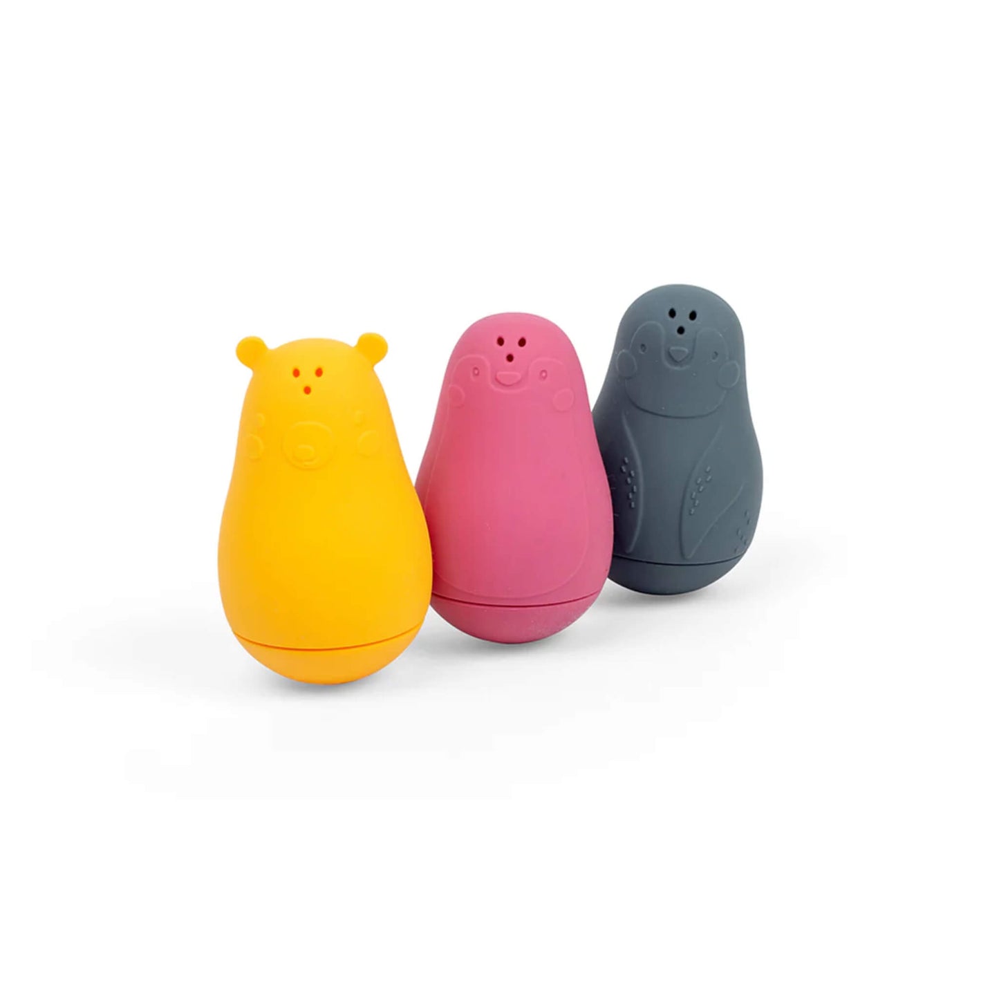 Side-angled view of the three Bigjigs Silicone Bath Buddies, highlighting their rounded shape and top holes for water play.