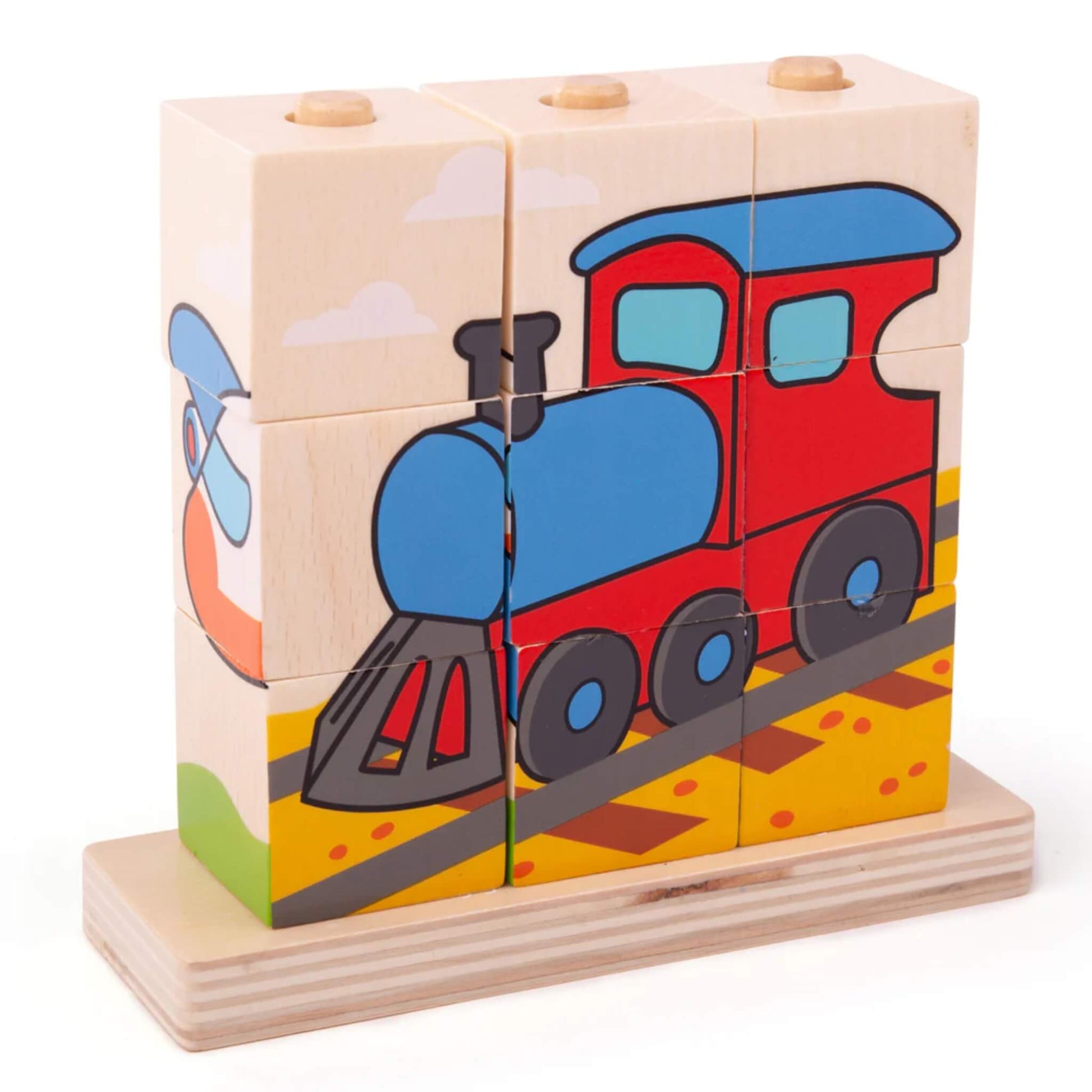 Transport-themed puzzle completed to show a red and blue steam train on yellow tracks, made from nine wooden cubes stacked on a smooth wooden base.