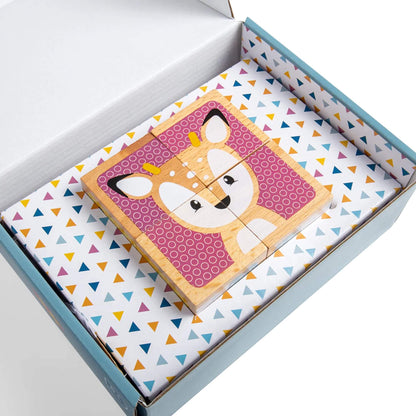 FSC® Certified Woodland Cube Puzzle featuring a completed deer face, presented inside an open box with a colourful patterned interior.