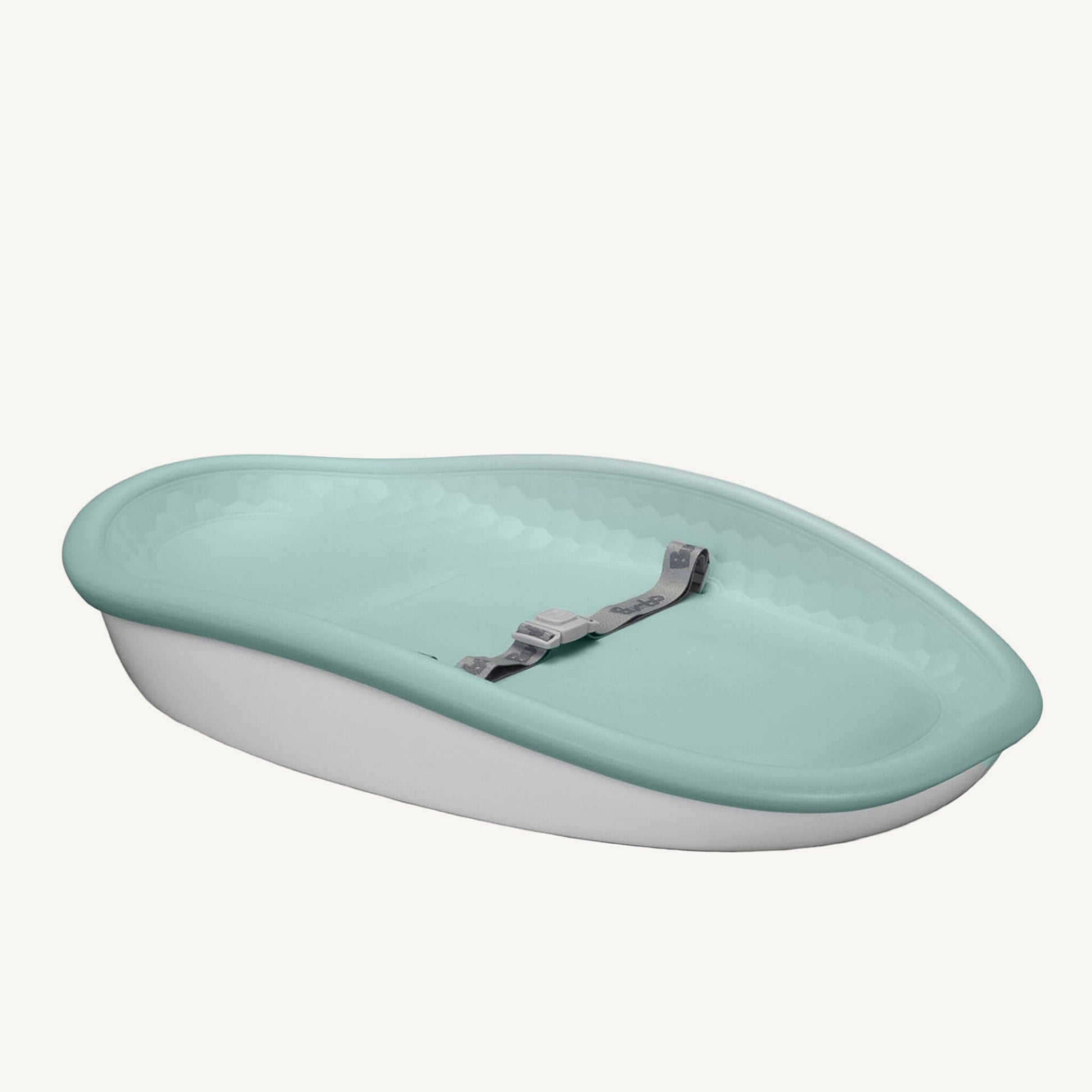 Bumbo Max Changing Pad in Hemlock featuring contoured foam design and secure safety harness.