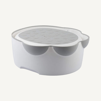 Bumbo Step ‘n Potty converted to toilet step, lid neatly stored underneath.