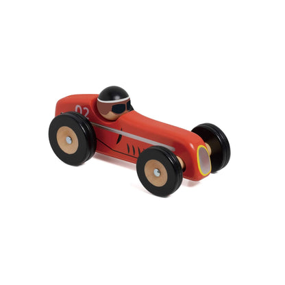 Classic World Monaco toy car, red wooden race car with black wheels, number 02 detail, and a small wooden driver figure wearing a black helmet and goggles.