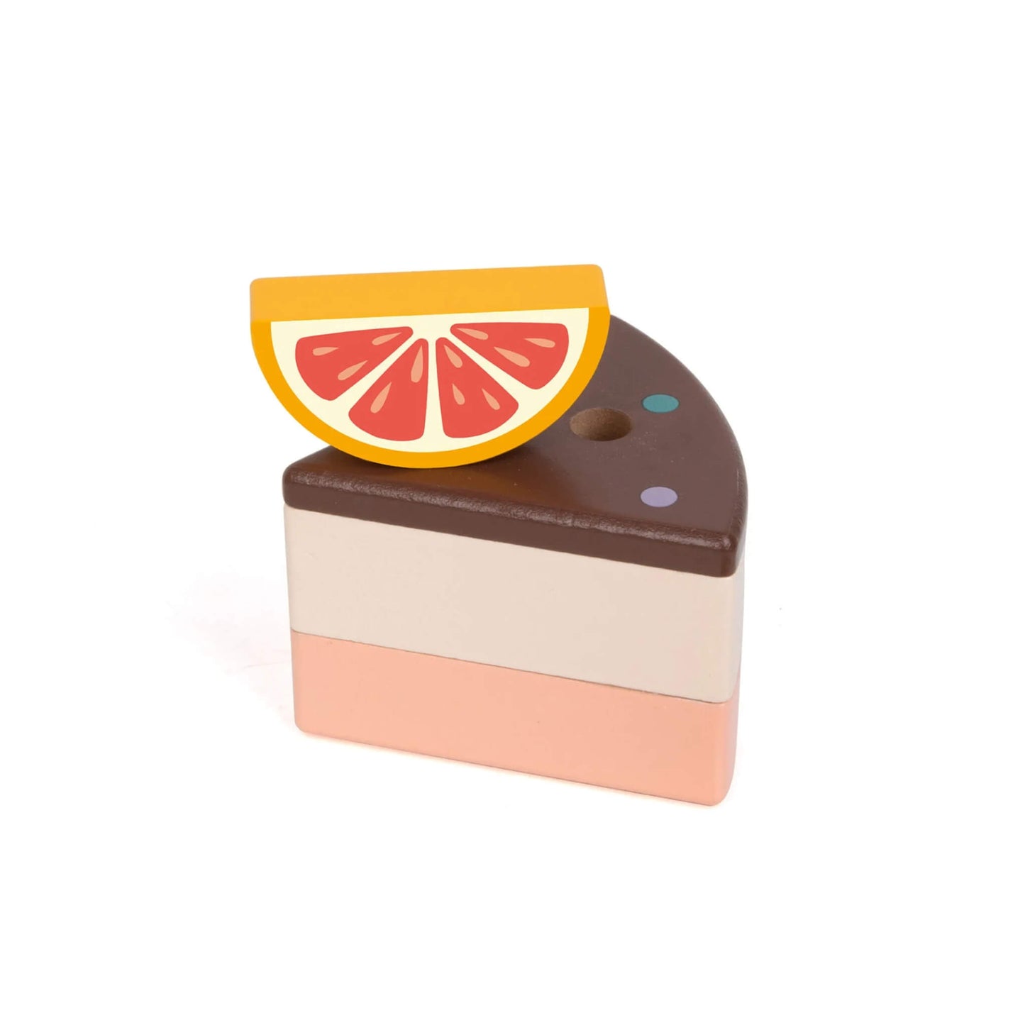 A single wooden cake slice with a grapefruit-style wooden fruit topper, showing layered chocolate, cream, and pink sections.