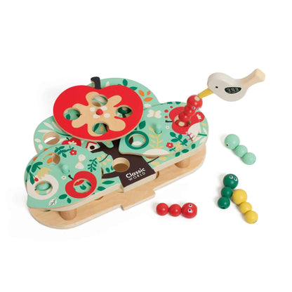 Classic World Doctor Woodpecker toy with colourful wooden tree board, rotating apple slice, magnetic bird tool, and wooden caterpillars in bright colours.