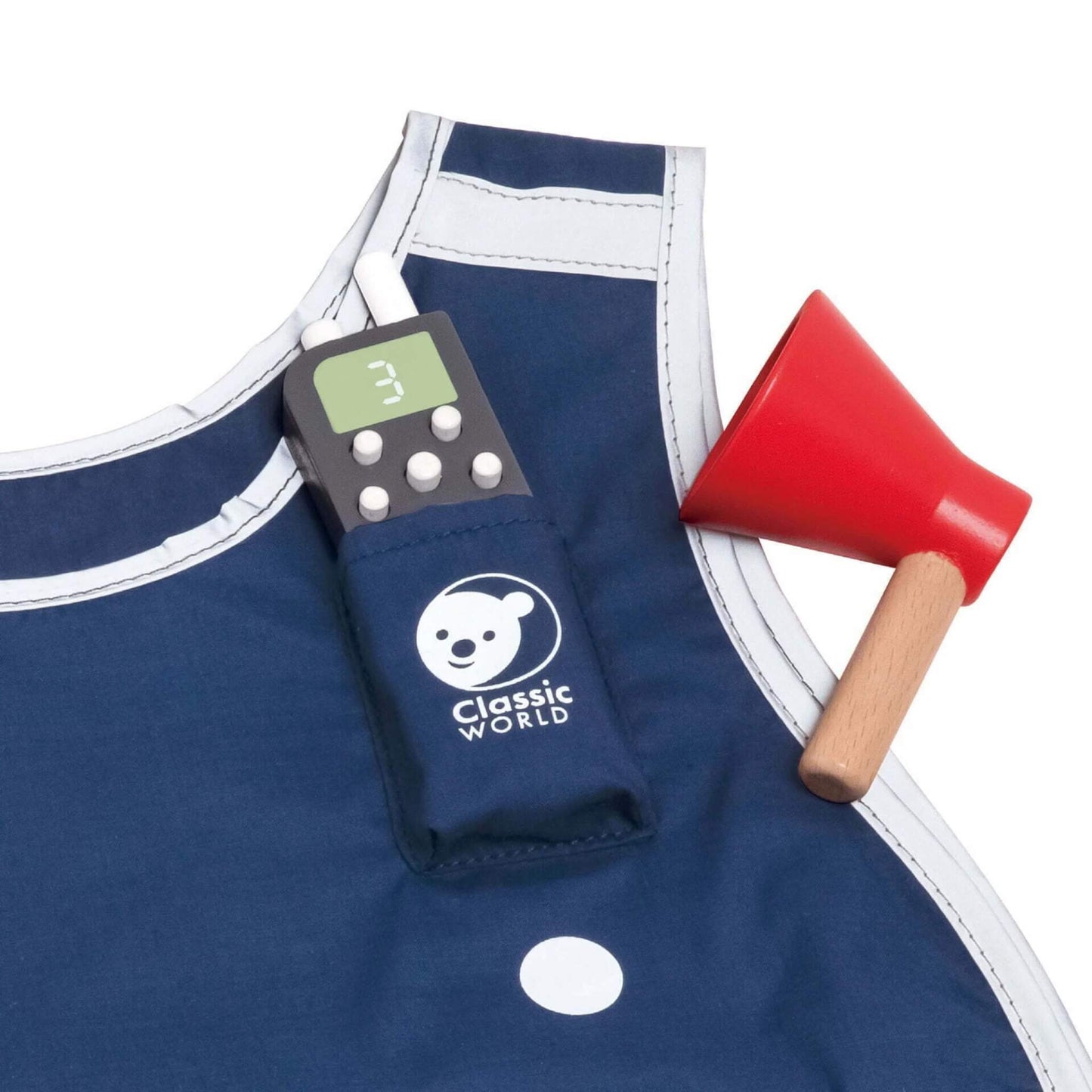 Close-up of the blue firefighter dress-up vest with Classic World logo, showing a toy walkie-talkie in the pocket and red wooden megaphone nearby.
