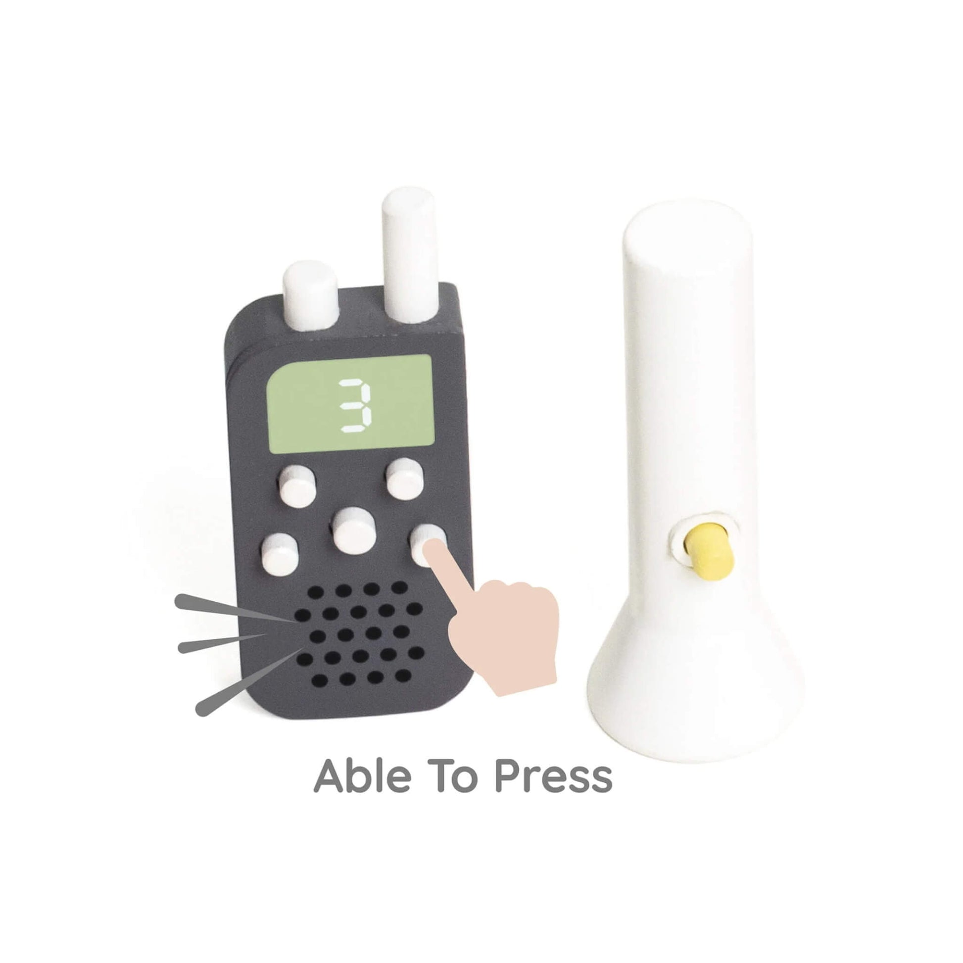 Toy walkie-talkie and toy flashlight with pressable buttons, part of a children’s firefighter role-play set.