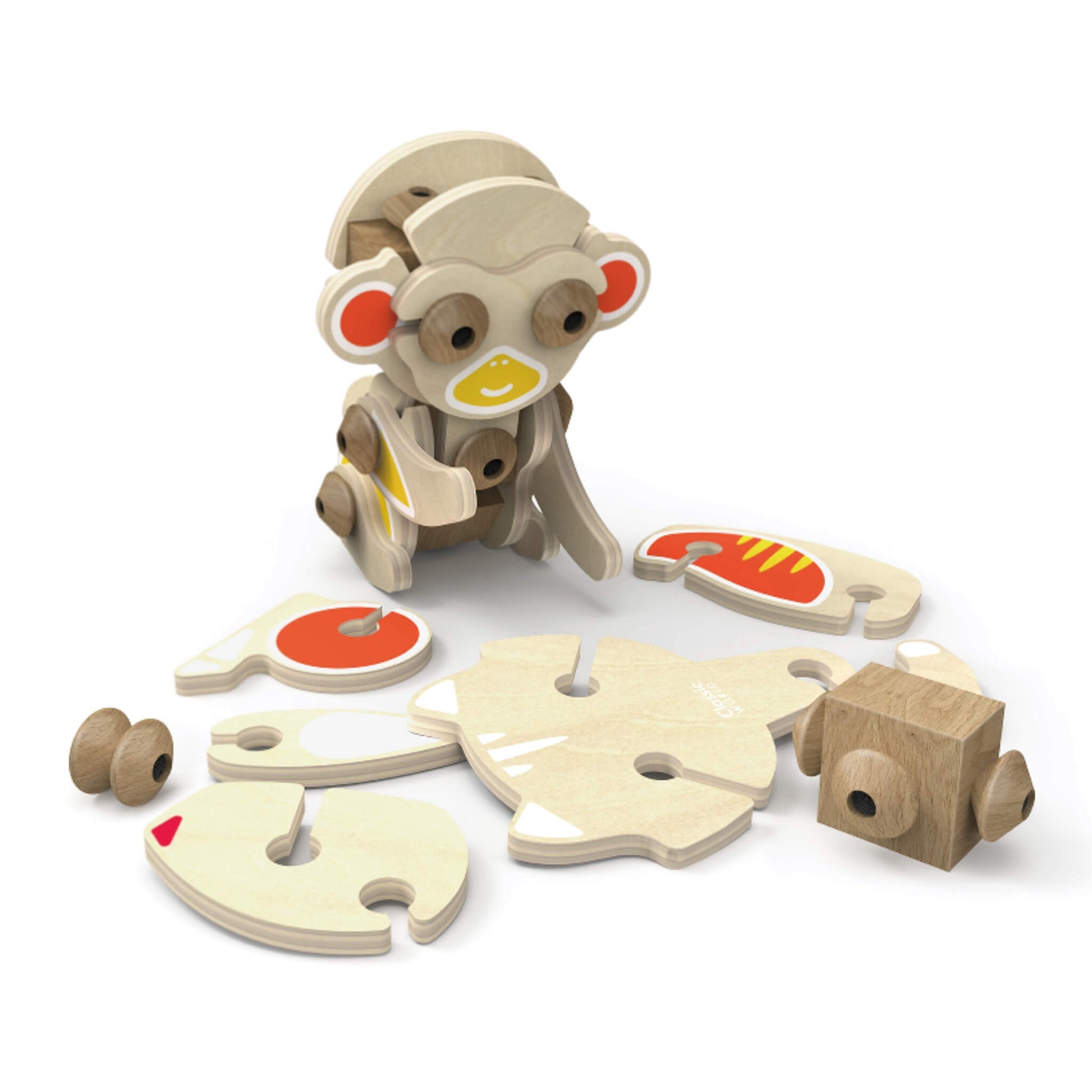 Wooden animal construction toy pieces laid out including body parts and connectors showing how the set builds different animals.