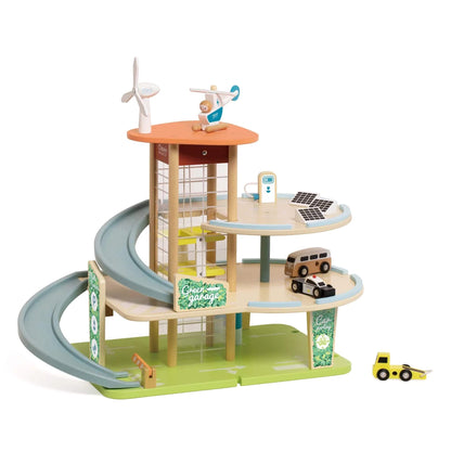 The Classic World Green Garage, a wooden eco-themed playset with ramps, solar panels, wind turbine, cars, and a helicopter.