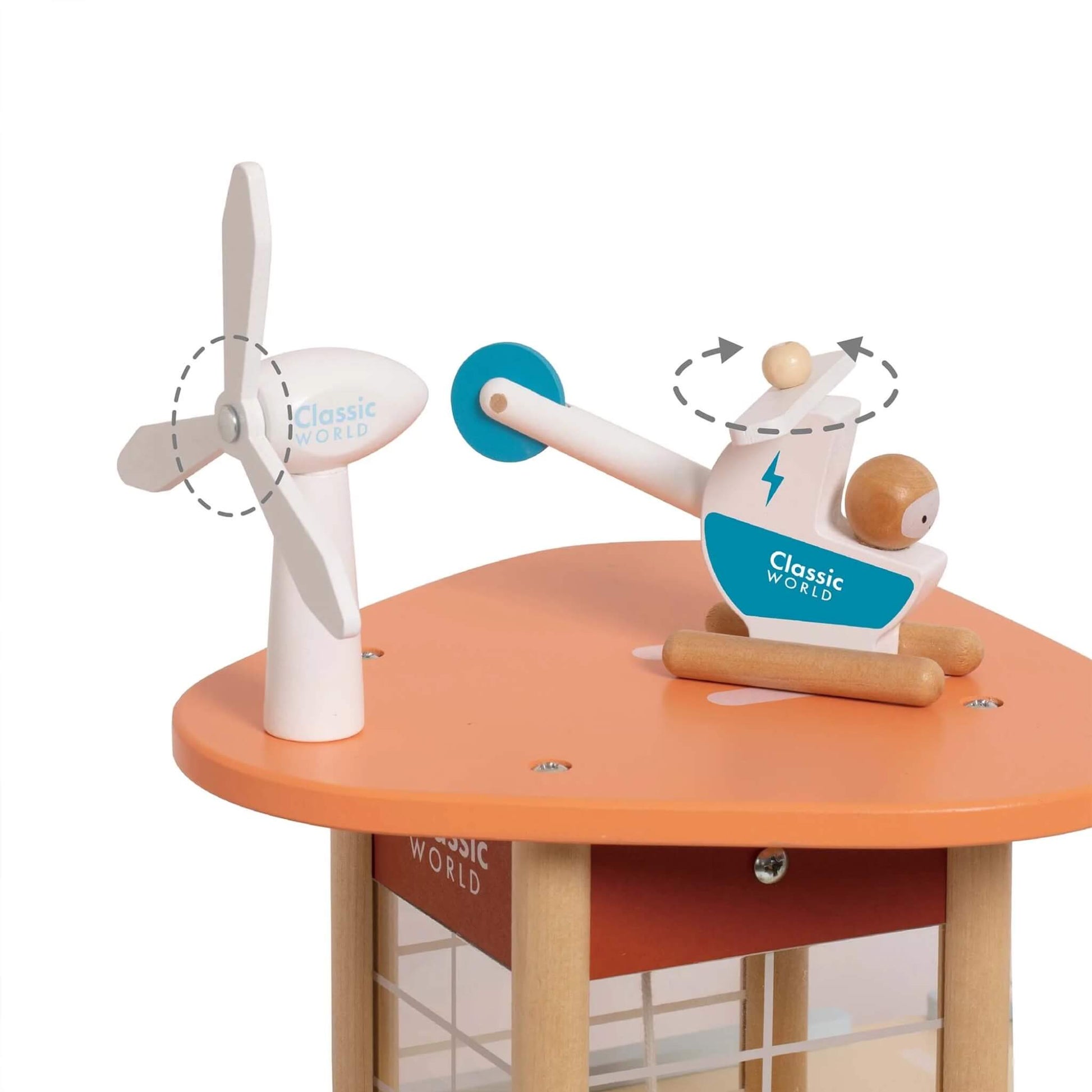 Wooden car garage rooftop scene with a toy wind turbine and a white helicopter with blue details, both with spinning parts.