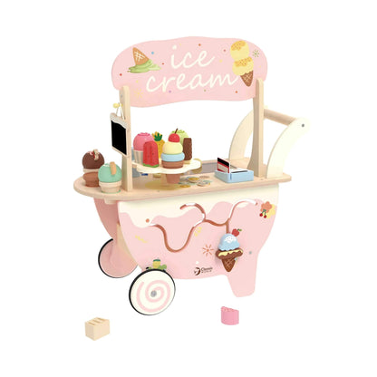 Side view of a pastel pink toy ice cream cart with a chalkboard menu, spinning ice cream display, wooden scoops, lollies, and a cash register with card.
