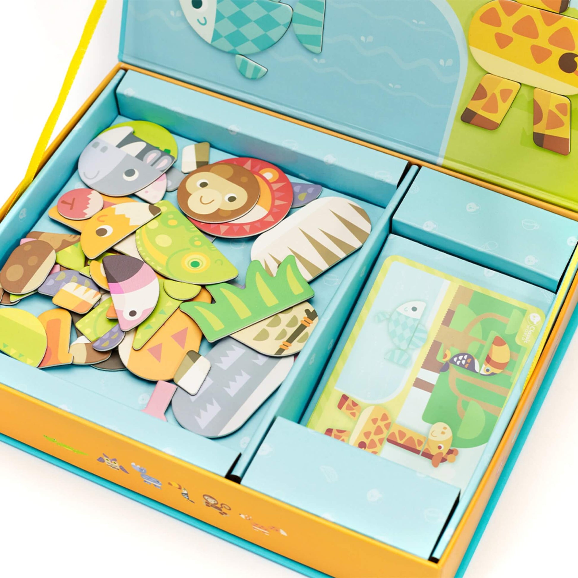 Close-up of wooden magnetic animal pieces stored in compartments showing colourful shapes and character parts.