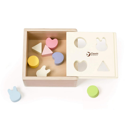 Wooden Shape Sorter with pastel coloured wooden shapes. Featuring slots for fun learning and sorting.