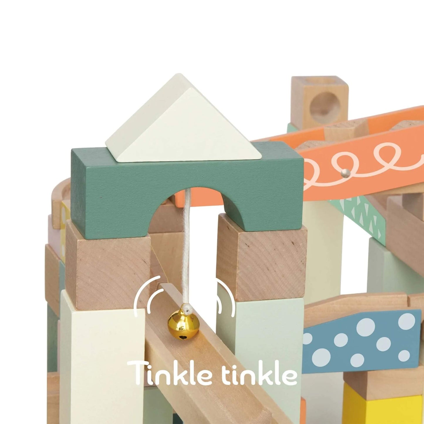 Close-up of the top archway from a set of wooden blocks with a gold bell hanging and pastel-colours.