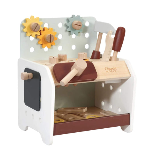 A compact wooden mini workbench from Classic World, designed for young children, with pastel-coloured gears, tools, and a pegboard for creative play.