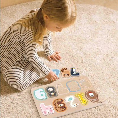 A child playing with a wooden Number Puzzle, featuring animal-themed wooden pieces for learning numbers 1–10 through hands-on fun.