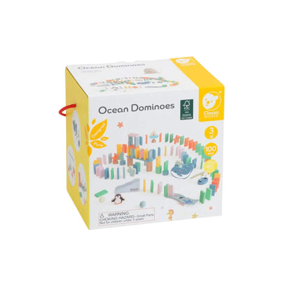 Packaging box for the Classic World Ocean Dominoes set, showing product photos and details, with a yellow background and red handle.