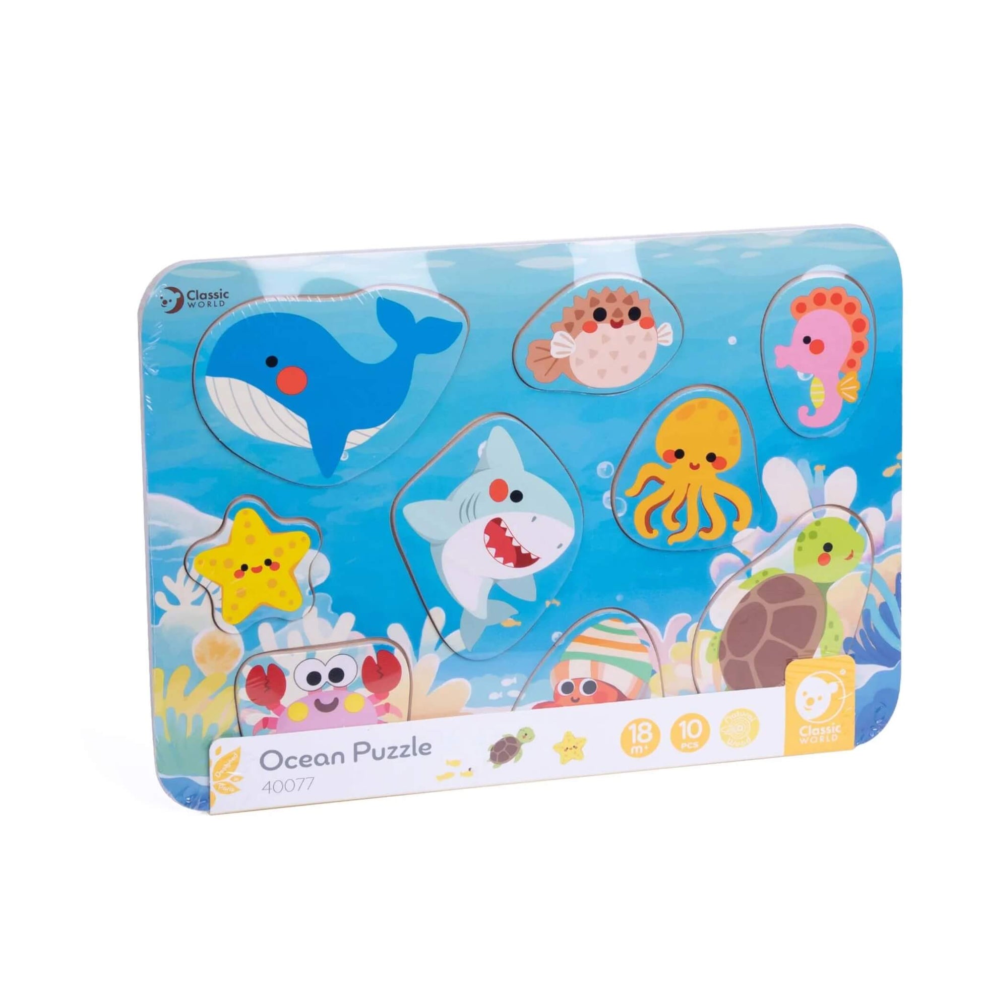 Classic World Ocean Puzzle in packaging, showing a wooden board with colourful ocean creatures including a whale, shark, octopus, seahorse, starfish, crab, turtle, and pufferfish on a blue undersea background.