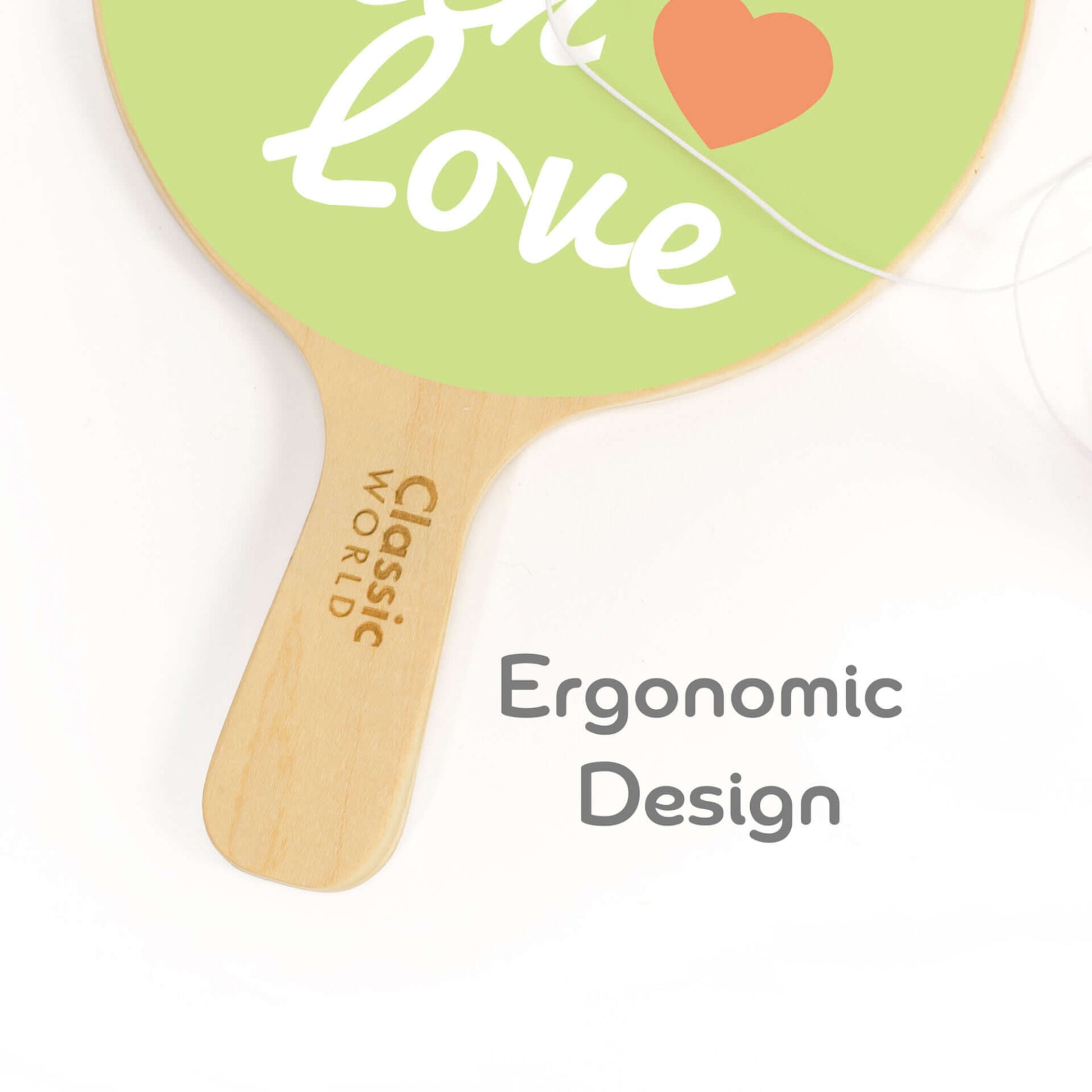 A close-up of a child’s wooden paddle ball toy with a smooth, ergonomic wooden handle and part of the green paddle face showing the Classic World logo.