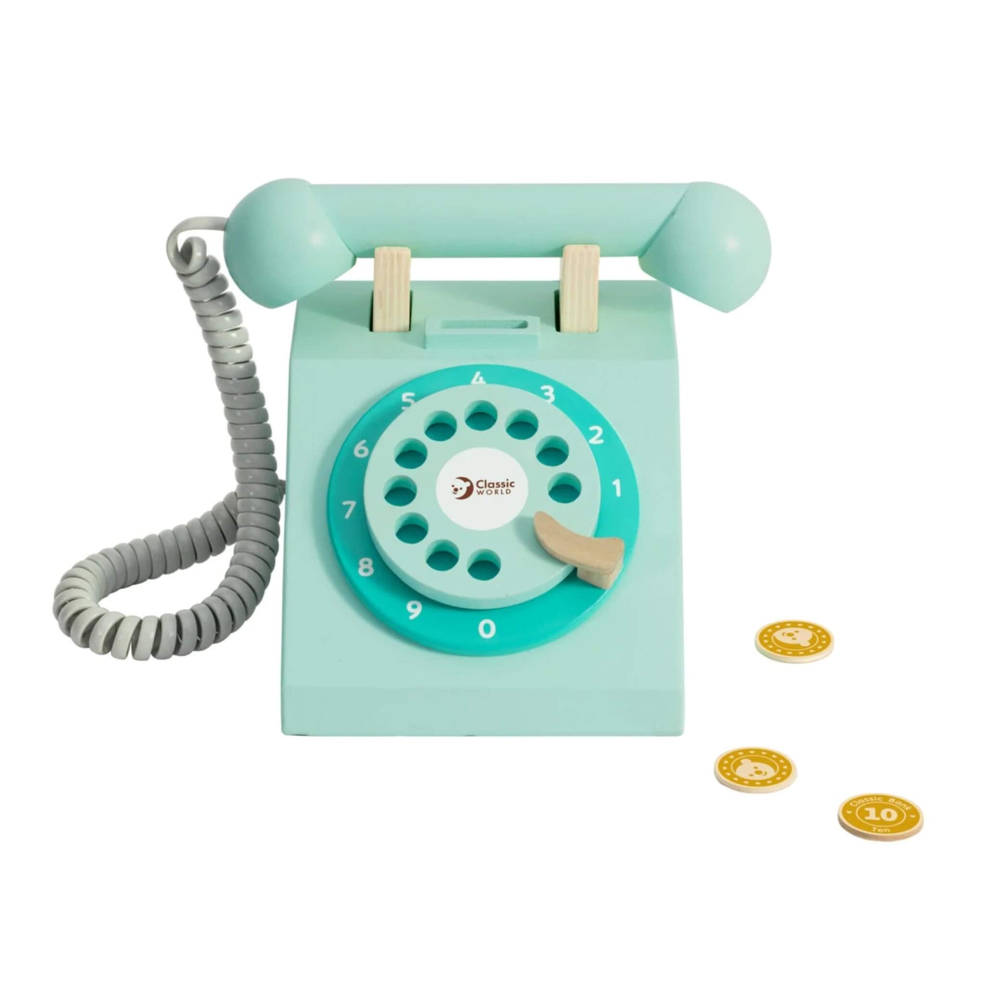 Classic World wooden toy telephone in pale turquoise with a rotary-style dial, a coiled cord, a matching handset, and three gold play coins lying beside it.