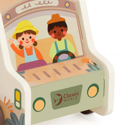 Close-up of the front cab showing painted illustrations of two smiling children driving the safari truck, with the Classic World logo below.