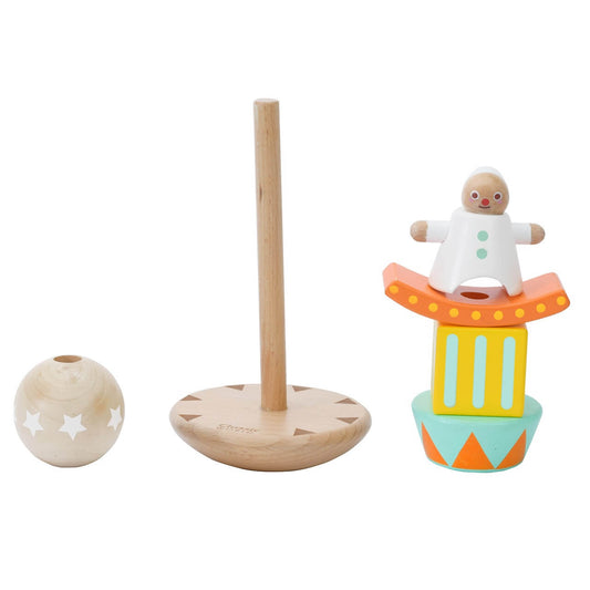 A disassembled Stacking and Balancing Clown toy, showing colourful wooden blocks, a clown figure, and a sturdy base.