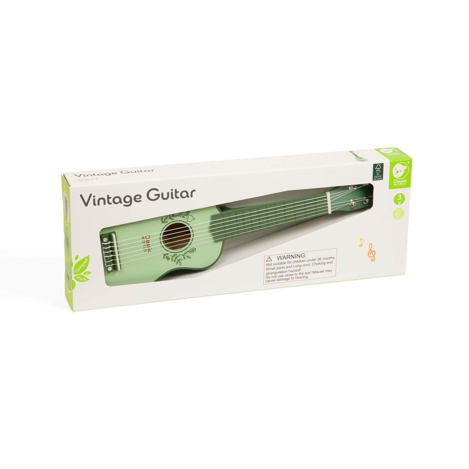 Pastel green wooden child's classic style guitar, in it's packaging.