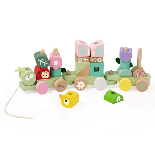 Wooden Pull Jungle toy with an array of different building blocks in pastel colours.