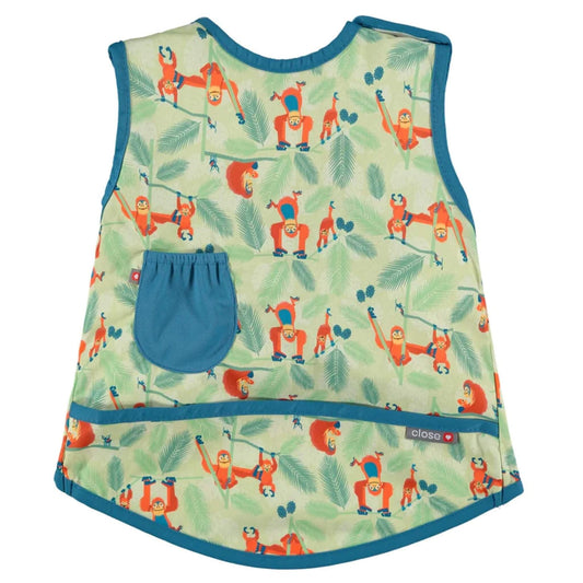 Close Apron Bib with Orangutan design  shown from the front with a sleeveless apron shape, teal trim and an orangutan print in orange and green tones.