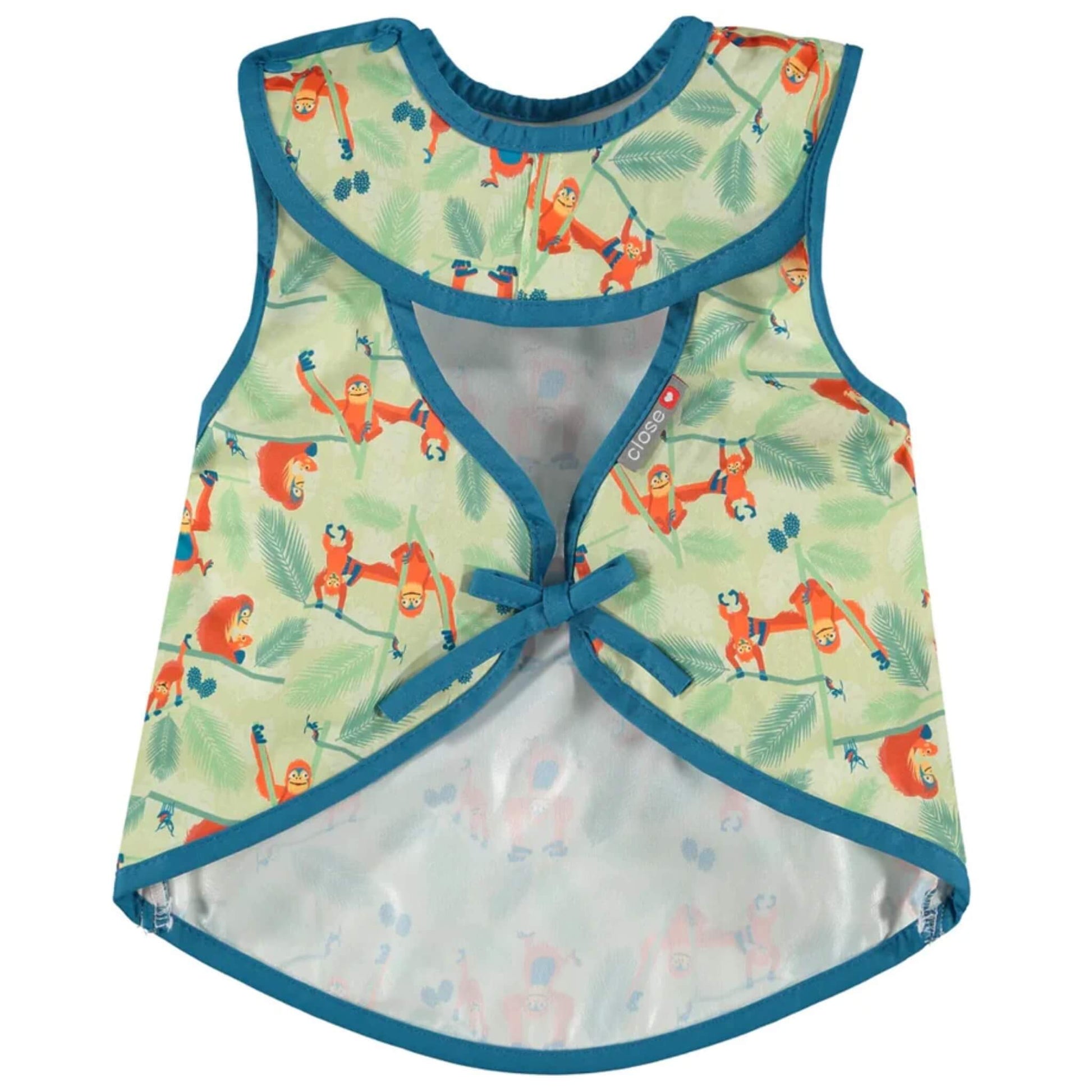 A sleeveless apron-style baby bib shown from the back with teal trim, an orangutan print and a simple tie fastening at the waist.