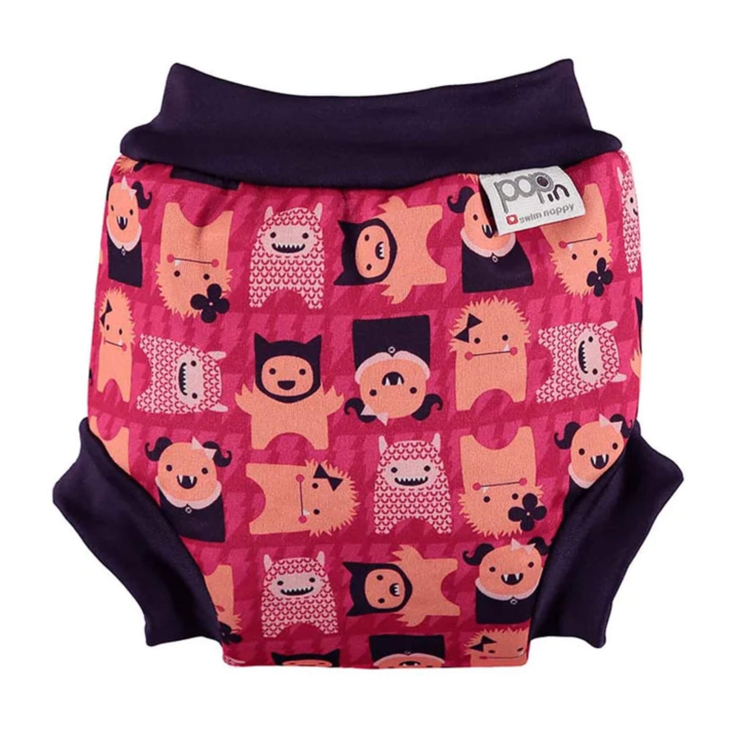 Close Swim Nappy with Monster Edie print shown from the front with a dark waistband and a pink patterned print featuring playful monster characters.
