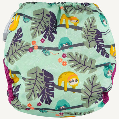 Back view of a reusable nappy cover with sloth and leaf illustrations on a mint green background, gathered softly around the waist.