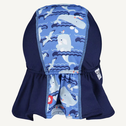 A toddler sun hat shown from the back with a central whale-patterned panel and a wide extended neck cover in deep navy.