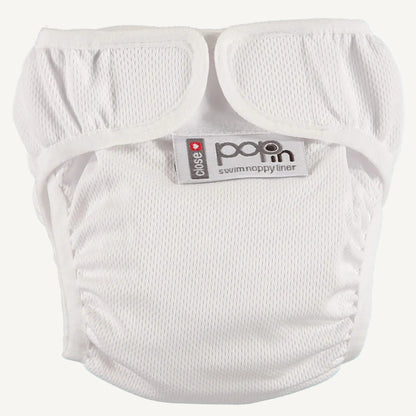 A white swim nappy liner displayed with its fastening tabs opened, showing the soft interior fabric and lightly textured outer surface. The leg openings are elasticated and gathered for comfort and containment.