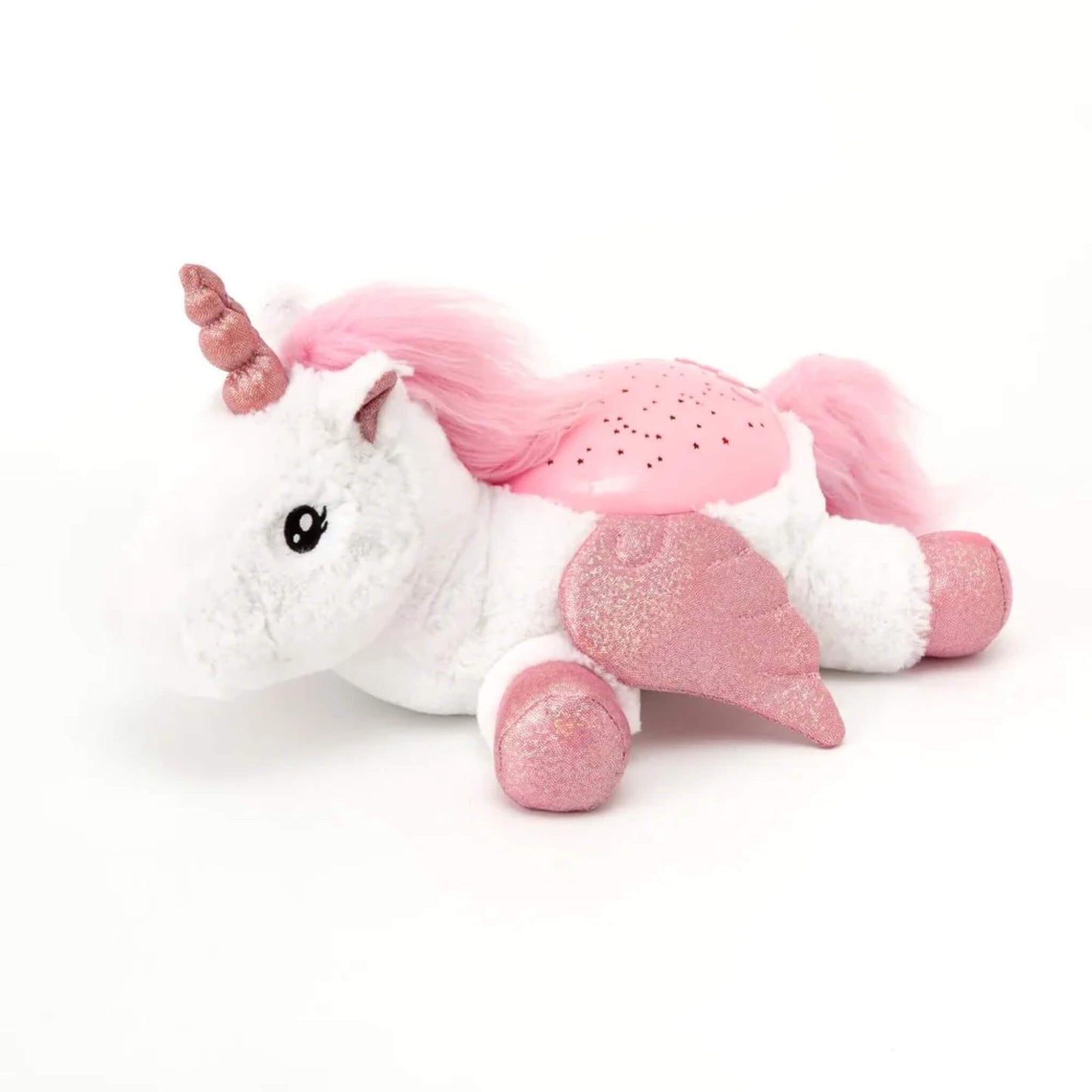 A plush unicorn kids night light in a resting pose with a pink perforated dome on its back for star projection, glitter wings and hooves, and a soft pink mane.