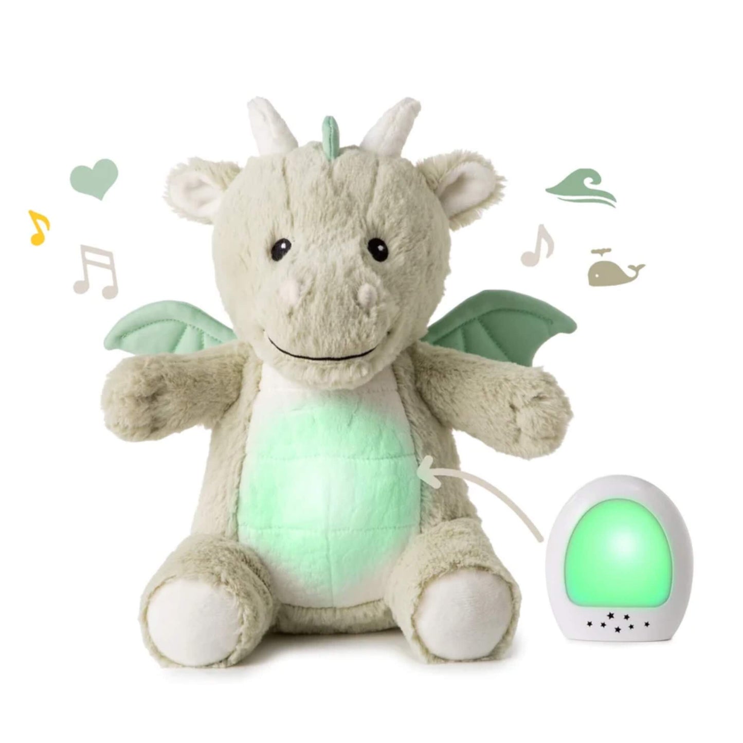 A plush dragon toy with green wings sits upright while its tummy glows green, next to a removable white nightlight device.