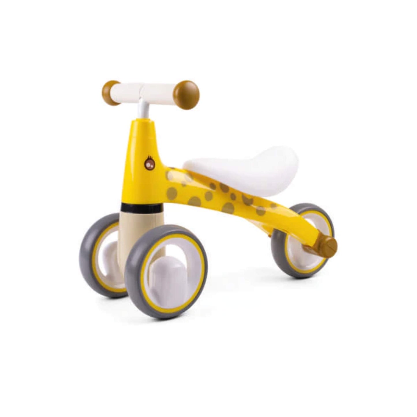 Didicar DidiTrike Giraffe design shown from a front-side angle, featuring yellow and beige styling, brown giraffe spots, and a white contoured seat.