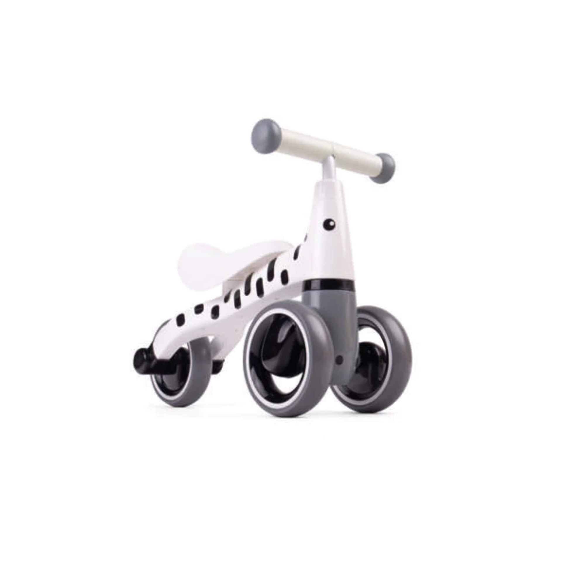 Angled shot showing the full stripe pattern along the frame and the clean, minimalist look of the zebra-themed ride-on.