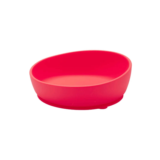 A red Doidy Bowl shown from an angled view, featuring the brand’s signature slanted design and a suction base to help reduce spills during baby-led weaning.