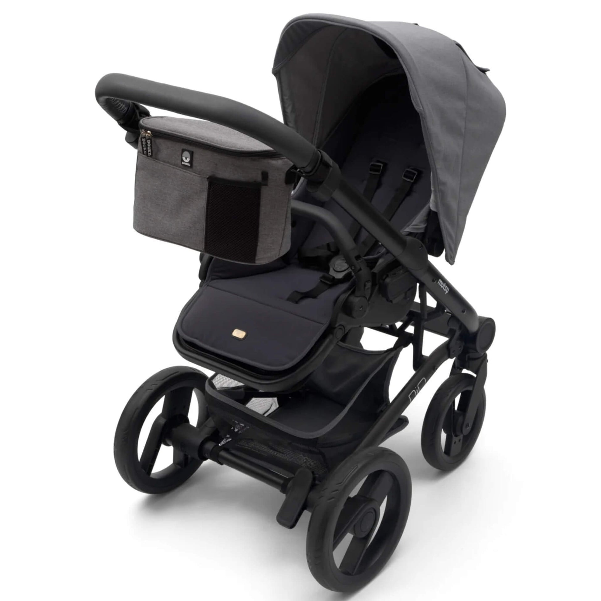 Grey buggy organiser attached to a black pushchair handlebar, positioned above the seat.
