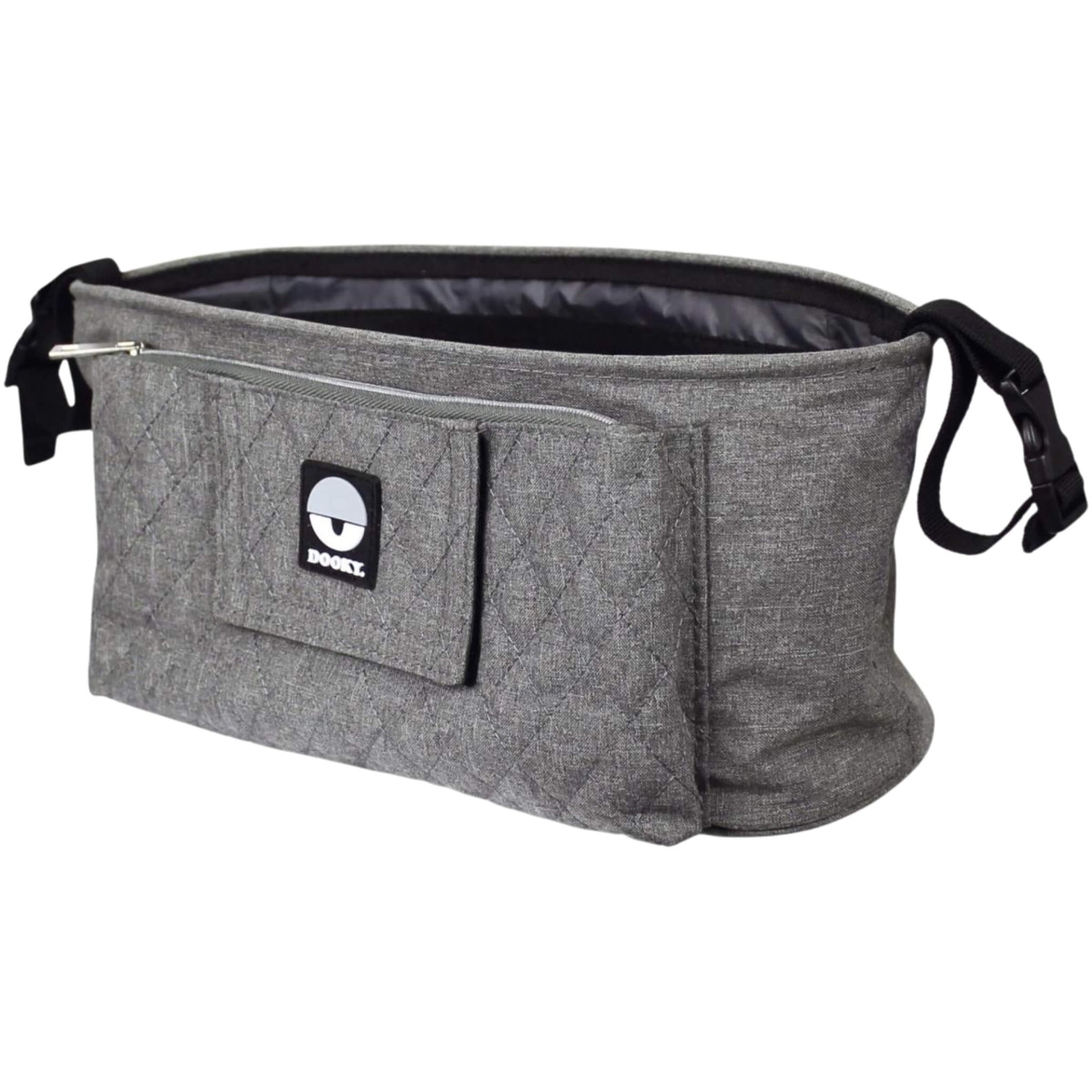 The Dooky Buggy Organiser in grey, with quilted front panel, zip pocket, and adjustable straps for attaching to a pushchair handlebar.