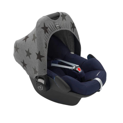 A Dooky Car Seat Hoody in grey stars print fitted to a navy infant car seat, creating shade and UV protection while adding a fresh new look.